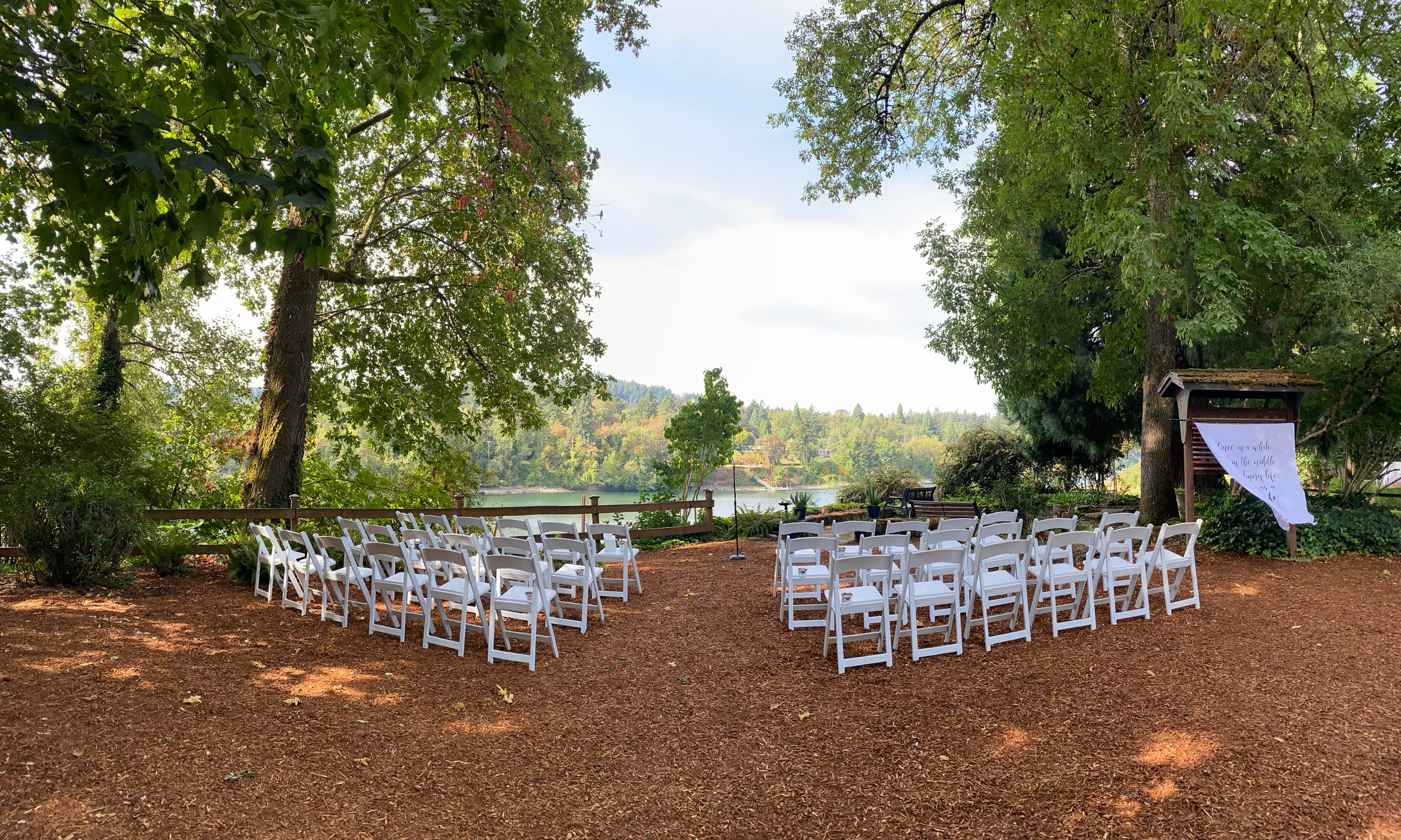 Garden wedding view of a wedding at Risley Landing Gardens in Oak Grove, Oregon. 